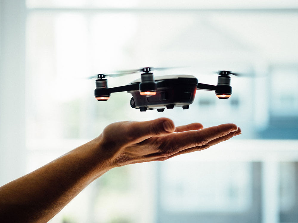 Picture of Drone flying over an open hand